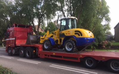 Terex TL120 shovel op transport